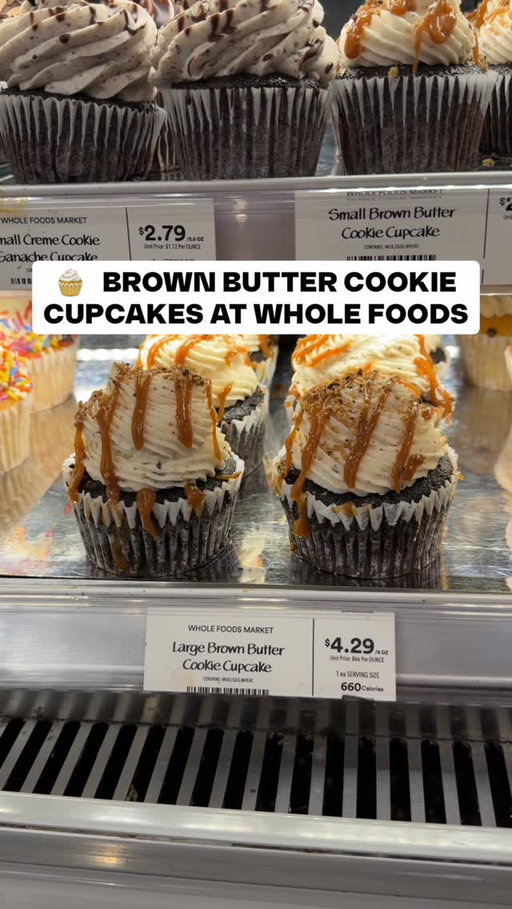 🧁 The Brown Butter Cookie Cupcakes in the Whole Foods bakery case look unreal! That tall swirl of frosting with caramel drizzle on top is such a showstopper, and you can grab them in small or large sizes depending on your sweet tooth 😍 Perfect for celebrations or just because! $4.29 #WholeFoods #wholefoodsmarket #cupcakelover
