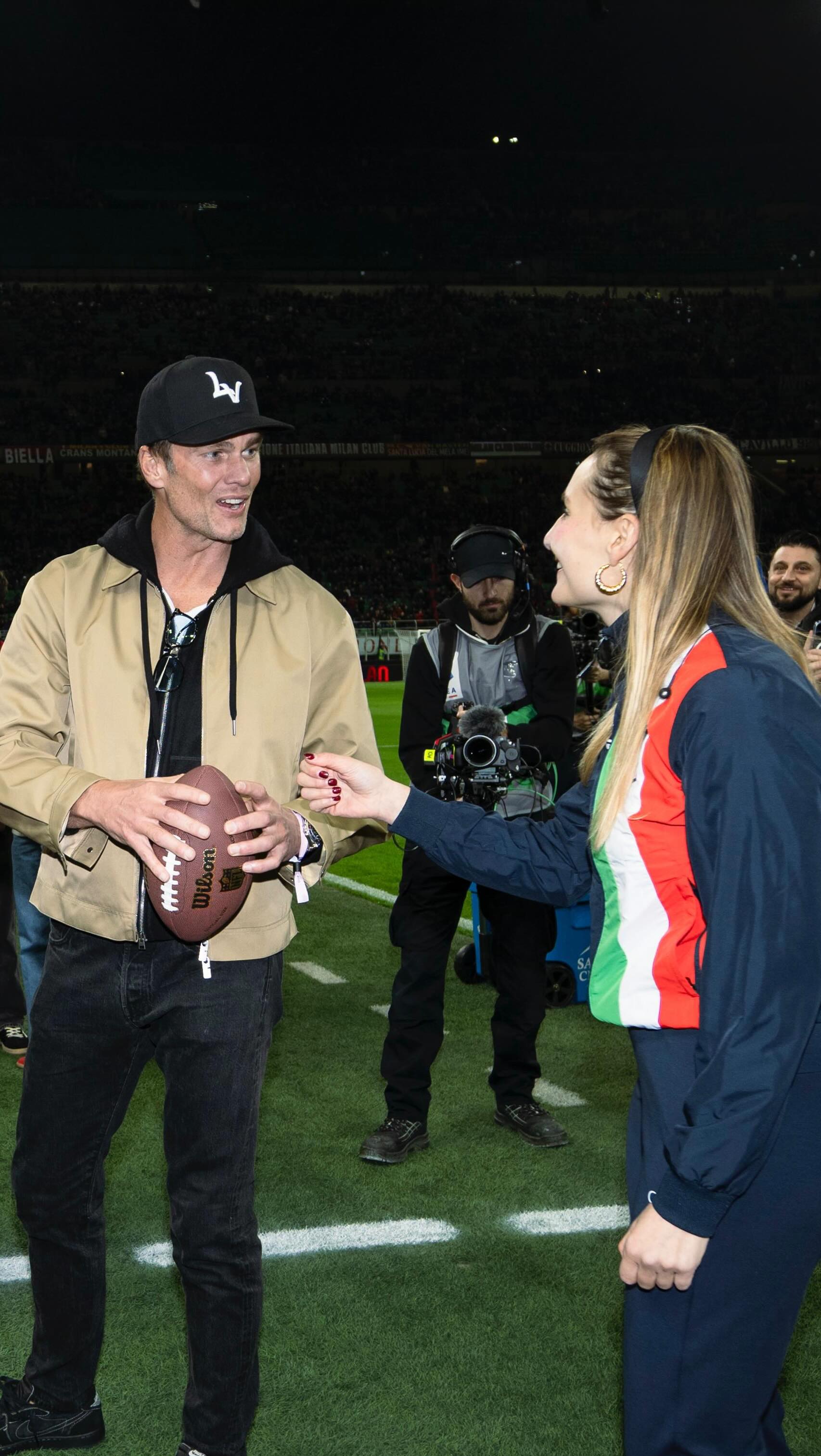 San Siro is not just a stadium to me. It is childhood memories, Sunday nights with my brother and sister, dreams built in the stands.

So being invited there, on that field, to introduce Tom Brady, the man who needs no introduction, to the entire stadium, felt surreal in a way I still struggle to put into words.
In my hometown. In the stadium that shaped my love for sports. Representing the game that shaped me.

We spoke about flag football, about its Olympic future, about how much this sport is growing. And in that moment, everything felt connected. Milano Cortina handing the torch to the next Olympics. Italy to LA28. Soccer to football. Past to future.

What made it even more special was who he was off camera. Present. Warm. Human! He listens. He respects the game and, most importantly, the athletes who dedicate their lives to it. You can sense when someone truly values the sport beyond the spotlight, and he does.

Thank you @acmilan and @alesunseeker I will never forget this moment!🏈