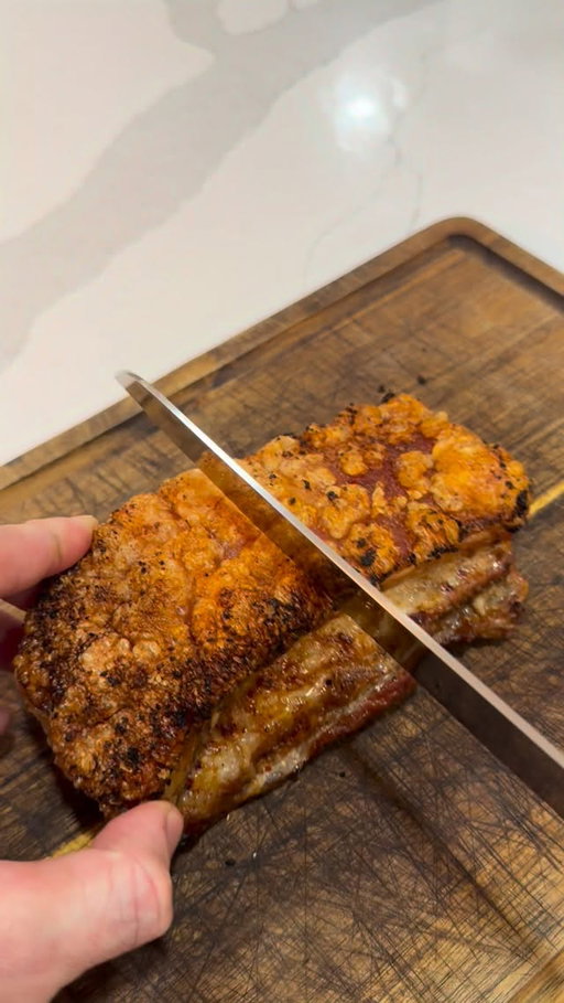 Crispy slow cooked pork belly. Couldn’t be simpler this one. 🐖 

@butcherfarrell beautiful 2.5kg free range boneless pork belly (this is just under 1kg of it)

No BBQ today, weather wasn’t playing ball. 

- Prick the skin of your belly and liberally cover in salt, leave in the fridge overnight to draw out the moisture 
- Oven pre heated to 90c
- Knock off excess salt and apply the seasoning of choice (Chinese salt and pepper for me)
- In the oven for an ungodly number of hours. I opted for 7 with no logic behind it, but waited until internal temp was above 60c
- Crank the heat to 220c
- Apply white vinegar to the skin and make a foil boat to cover all the flesh leaving the skin exposed
- Back in the oven to blister the life out of the skin. 
- When it smokes, it’s done.

When you’re cooking that slowly for that long, the layers on layers of fat, meat, fat, meat, all sort of render into one. Tender, wet, juicy, burnt edges, crispy, quality.