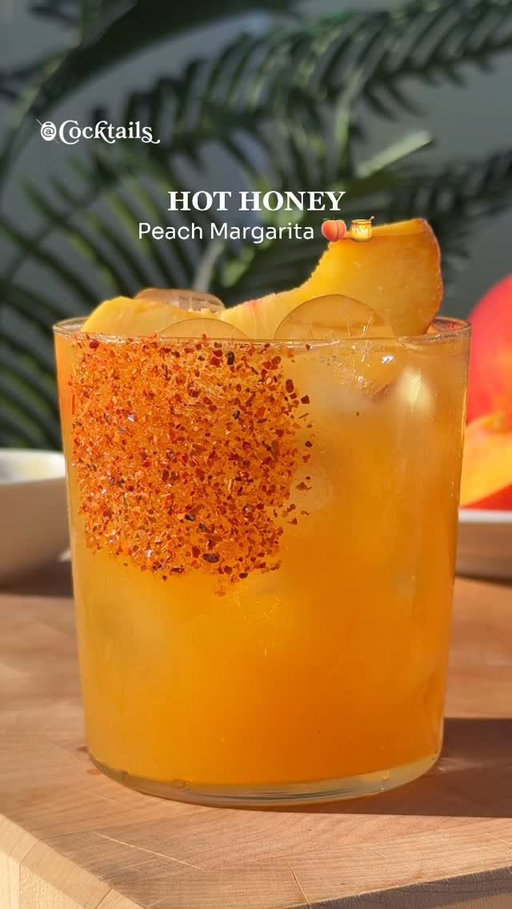 Happy National Margarita Day! 🍋‍🟩✨

Ingredients:
- 2 oz. peach purée 
- 1.5 oz. tequila
- .5 oz. Cointreau 
- .5 oz. lime juice
- a few dashes of hot honey
- rim glass with hot honey and Tajín
- garnish with a peach slice 

#nationalmargaritaday #margarita #hothoney #peach #cocktails