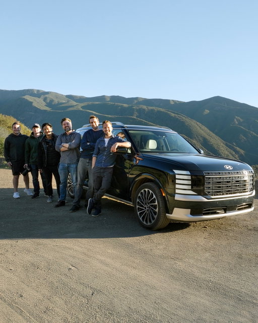 CREW. CREW. CREW. We are halfway through posting the films we made in California and each time we do this sort of trip, one unlucky yet spacious automobile must become the camel to carry our water. The donkey to bear our load. The cow to bring us our…milk?

This time, it was the NEW Hyundai Palisade. A model that is really starting to lean into its first two syllables. Beautifully appointed, spacious, clean, and exactly what a Range Rover interior would be if you described it to an alien.

The exterior isn’t nearly as clean as the RR though, as some of you may already be reaching with your thumbs to point out. And I get that, the front looks like a rack server in one of those farms that’s ruining the local water supply so that a certain elected official can pretend to beat up Canadians on ice. But it carried our gear and our cronies without complaint.

Well, some complaint. But very small. Compared to the British marque it so criminally copies, third row passengers will have to deal with more wind and road noise. It is significantly louder back there than the front two rows. Also, the 2.5L 4cyl hybrid works well, and even feels spritely with 329 hp, but its less-than-musical note ruins the illusion that you are in something much fancier.

Otherwise, from the driver’s seat, it genuinely feels every bit its 58K US asking. And that’s for this well spec’d Calligraphy trim. 

Hyundai knows how to play to their strengths. Even though the price point robs them of fancy air suspension or a sexy powertrain or rear wheel steer, they go ham where they can. Namely the cabin. Highly adaptable comfortable seats, double sunroof, softly sprung ride and all the creature comforts you could ever need are ticked, short of soft-close doors. That, and driver inputs require minimal effort and steering progresses naturally.

Everything feels light and airy. Purposeful and honest. With just enough physical knobs to forgive the capacitive stuff.

Would we take this over a Toyota Grand Highlander or a Honda Pilot? Dunno, haven’t tried the new ones of those, but this Palisade is good. Curious to try the new Telluride now and not just because of the orange DRLs.

@jamesengelsman