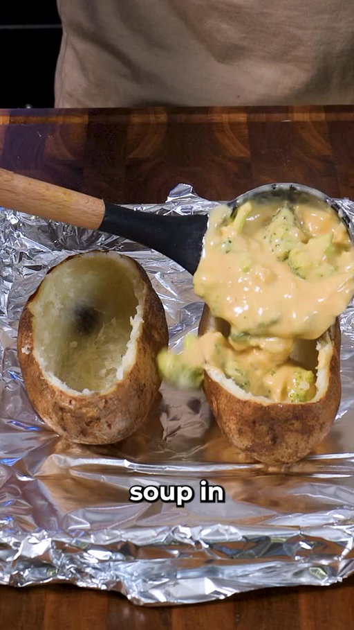 Cheddar Broccoli Twice Baked Potato

INGREDIENTS & RECIPE 👇🏻
4 large russet potatoes
1 cup cooked bacon bits
1/2 cup chopped chives
1/2 cup sour cream
2 tbsp garlic powder
2 tbsp onion powder
1/4 cup soft butter
SOUP
2 cups evaporated milk
2 cups chicken stock
1/4 cup all purpose flour 
1 cup diced onion
3 minced cloves of garlic
3 cups chopped broccoli 
2 cups grated sharp cheddar cheese
1/4 cup hot sauce
Salt and pepper to taste 

Poke a few holes in the potatoes and coat them with olive oil and salt

Bake the potatoes at 425 degrees F for 1 hour 

Let the potatoes slightly cool and slice the top off

Scoop the inside potato out into a bowl and mix in the bacon, chives, sour cream, garlic, and onion powder, butter, salt and pepper. Transfer to a piping bag or ziploc bag

Melt 2 tbsp of butter in a medium soup pan

Add the onions and cook for about 5 minutes

Add the garlic and salt and pepper and cook for another 3 minutes or until the garlic is fragrant

Mix in the flour and cook until the flour is golden brown

Slowly mix in the evaporated milk and chicken stock

Add the broccoli and simmer for 10 minutes

Mix in the cheese a handful at a time adding more once the cheese is melted

Mix in the hot sauce and season to taste with salt and pepper

Add a ladle to the hollowed out potatoes and fill almost to the top

Pipe the mashed potato mixture on top

Bake in a 450 degree oven for about 10 minutes or until the top is golden brown