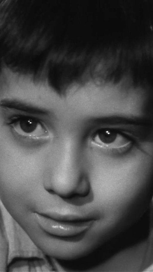 This film is considered one of the most emotional and impressive religious/spiritual dramas of world cinema.

Marcelino: Bread and Wine (Marcelino Pan y Vino) is a timeless 1955 Spanish classic directed by Ladislao Vajda, based on the beloved novel by José María Sánchez Silva. The story follows Marcelino, a small orphan left at the door of a monastery and raised by monks, whose curiosity leads him to a forbidden attic — and to a mysterious friendship that quietly transforms his life.

Lonely yet full of imagination, Marcelino grows up between playful mischief and a deep, unspoken longing for a mother he has never known. When he discovers a life-size crucifix in the attic, he believes the figure is hungry and cold, and begins bringing it bread and wine — a simple act of kindness that unfolds into a miracle and a profoundly moving journey about faith, innocence, love, and hope.

Blending gentle humor with powerful spirituality, the film became one of the most internationally successful Spanish films of its era, touching audiences across generations. The unforgettable performance by child actor Pablito Calvo gives the story its emotional core, turning Marcelino into one of classic cinema’s most memorable child characters.

Shot in poetic black-and-white and filled with warmth, wonder, and quiet heartbreak, Marcelino: Bread and Wine is more than a film — it is a cinematic experience about compassion, the purity of a child’s faith, and the miracle that can grow from the smallest act of love. A timeless story that builds toward one of the most tender and unforgettable endings in film history.