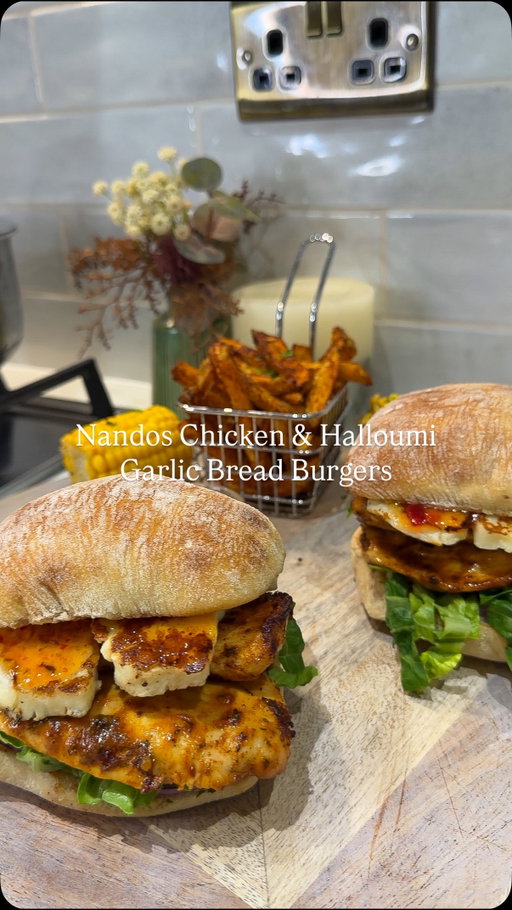 NANDOS CHICKEN & HALLOUMI BURGER 

Follow @kimberlys_journeyy for more recipes like this⤵️

For the chicken: 
- 300g chicken breasts 
- 2tbsp peri peri marinade 
- 1tbsp chicken seasoning 
- 2tbsp Peri peri sauce 

For the burgers:
- 2 ciabatta rolls 
- 15g garlic butter 
- 50g reduced fat halloumi 
- 2tbsp chilli jam
- 2tbsp perinaise 
- Lettuce gem 
- Red onion 

Butterfly the chicken breast, add your marinade and then I cooked mine in m air fryer under the grill setting! 

When the chicken is almost cooked, fry or grill your Halloumi until golden. 

For the rolls, spread over the garlic butter and then toast.

Assemble the burgers with some chilli jam, lettuce, red onion and Nandos perinaise. 

We had ours with chips cooked in the air fryer and some corn on the cobs 

Making meals like this really help me keep on track over the weekend!

#nandosburgers