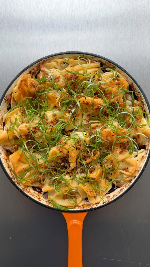 The love child of two of my all-time greats, a proper golden pie and crispy duck pancakes, enter: hoisin duck pie. Crispy, sticky, rich and saucy, with that pancake-style scrunch crust showered in crunchy duck skin. It’s outrageously naughty and I’m completely obsessed 🥧

4 duck legs
100g hoisin sauce
1 tbsp soy sauce
1 tbsp rice vinegar
1 tbsp five spice
1 tbsp dried coriander 
2 garlic cloves, crushed
1 thumb sized piece of ginger, grated
400ml chicken stock
1 bunch spring onions, whites finely chopped, greens split in half (half thinly sliced for ice bath, half sliced for sauce)
1 pack filo pastry, Chinese pancakes or spring onion wrappers

1. Prick the duck skin all over, salt well and roast at 180°C fan for 1–1.5 hrs until tender and crisp. Remove skin and finely chop it. Rest the meat then shred (keep all the fat).
2. Finely chop the spring onion whites. Thinly slice half the greens and plunge into ice water to curl. Finely chop the remaining greens.
3. Cook the spring onion whites with ginger, garlic, coriander powder and five spice in a little duck fat until soft.
4. Stir in the hoisin, soy, vinegar and stock, simmer briefly, then add shredded duck and chopped green tops.
5. Scrunch the filo/pancakes, brush with duck fat and sprinkle chopped crispy skin on top.
6. Bake 200°C fan, 20–25 mins until golden and crisp. Finish with the curly spring onions just before serving.