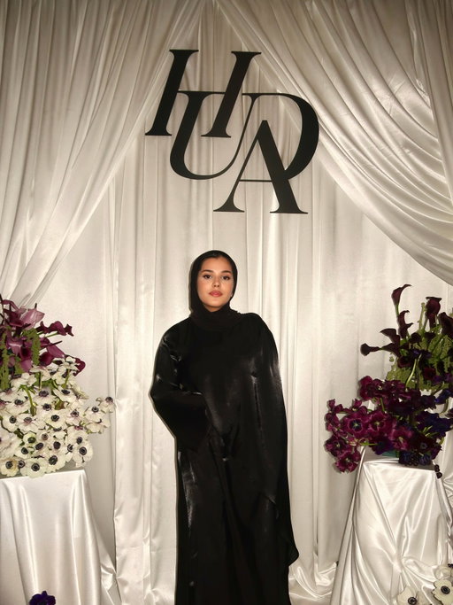 @hudabeauty iftar 🤍 
Draped in a cape abaya by @lesatelier.official ✨ The flash doesn’t capture its beauty, but trust me… it’s gorgeous!