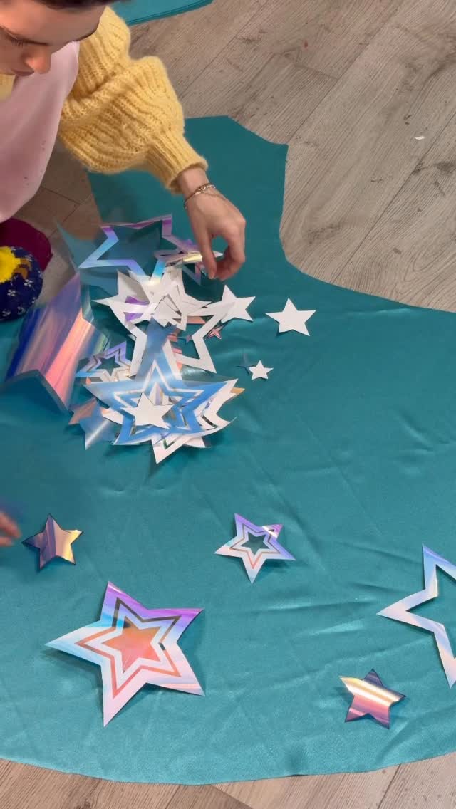 Making Rosalina’s dress from Mario Galaxy part 2! 🩵💫

Hi so I have been making progress on Roslina by putting on hundreds of these vinyl stars in a mixture of iridescent white and blue! 
I am going to be adding a bunch of rhinestones and smaller stars as well to tie everything together but next up is the bodice and underskirts! 😊

#mario #rosalina #sewing #cosplay #diy