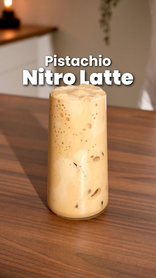 Creamiest Latte Ever 😍👀 Full Recipe 👇🏽

Nitro Pistachio Latte:
- add 1 tsp of pistachio cream/ spread into a fresh double shot of espresso 
- mix till combined than add 1 ice cube to cool it down
- pour the pistachio espresso into a whipped cream canister together with:
* 3-4 oz (90-120 ml)of your milk of choice, I used barista pea milk
* 2 oz/ 60 ml of cream, I used oat cream 
- infuse with nitrogen and shake, shake, shake
- spray your creamy latte onto some ice cubes

That’s it. Enjoy! 😁

#icedcoffee #icedlatte #coffeerecipe