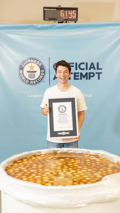 Today I made the World’s Largest Serving of Matzah Ball Soup with some help from @ChatGPT! Weighing in at 1,356 pounds this matzo ball soup was verified by @GuinnessWorldRecords as the biggest ever made! It took me and my team of 8 chefs over 13 hours to pull this off. Some crazy numbers to share are that the soup was made with 120 chickens, 850 hand-rolled matzo balls, 300 carrots, 250 bunches of herbs, just to name a few.

I couldn’t have done it without ChatGPT helping me at every step of the process! I used ChatGPT to scale up my family’s recipe to a huge 200 gallon version, to find what kind and where to purchase the right vessel to use as my “bowl” to hold giant soup, locate the largest pots available for purchase on the market, and even to find a professional weight measurement company for the video shoot in the New York area. I have no idea how I would have pulled this off without Chat on my team.

Once the final weight of the soup was called, my team and I labeled it all into containers to donate all the soup to @CityHarvestNYC to feed thousands of New Yorkers in need.

#ChatGPTPartner