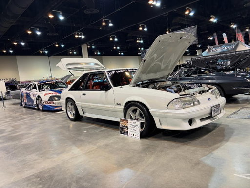 Moved in to the @hotrodshows Omaha World of Wheels. In with @south_omaha_speed Saleen SR.  Had a bit of drama on the way down but it was an easy fix. The @parallelmotorsports windshield banner looks right at home.  If you get a chance go check it out. 

#foxbodymustang #saleensr #hpmotorsports #omahaworldofwheels2026