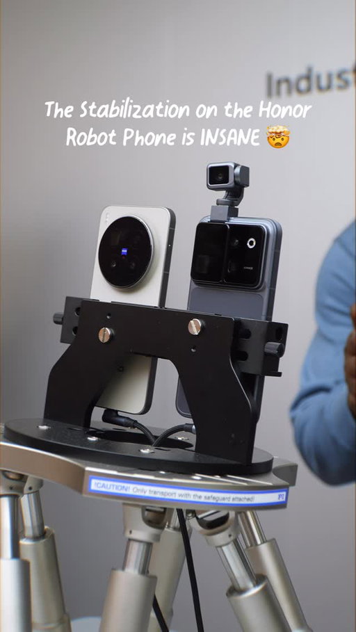 Honor Robot Phone Gimbal Camera is INSANE! This is the Robot Phone vs Vivo X300 Pro (representing any traditional flagship smartphone) and look how stable that is compared to a regular camera system. The last video shows a hand in place to show you it’s working in real time. This phone is real and will be released later this year! Is this a game changer? #tech #technology #smartphone #honor #camera