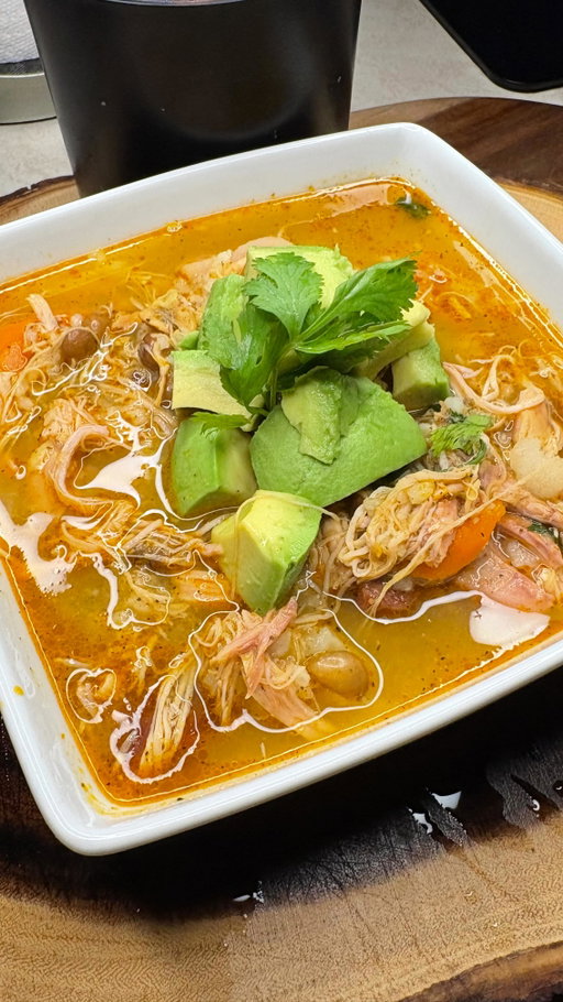 Asopao De Pollo Recipe 🇵🇷

* 5lbs Skinless Thigh (Bone-in)
* 2 packets Sazon or 3-4 Tbs Achiote oil (recipe pinned)
* 1Tbs Garlic Powder
* 2Tsp Onion Powder
* 1/2Tsp Cumin Powder
* 1Tsp Black Pepper
* 1Tbs Oregano Powder (I used Dominican powder)
* 1Tbs Adobo
* 1-2Tsp Salt (I used Himalayan)
* 2c Smoked Ham
* Fresh Sofrito 
* 2 Sazon-Sofrito cubes (Optional recipe pinned)
* 1Tbs Tomato Paste
* 1 can seco Gandules (rinse)
* 1 capsule apple vinegar
* 2 Bay leaves 
* 1/2c-3/4c rinse washed rice (I used medium grain)
* Potatoes
* Carrots
* Malanga Lilo (purple optional or use corn my market sold out) 

Just enough water for your pot add salt towards the end if needed, cook time total 1hr 40min let the spices from the chicken, smoked ham, Sofrito and produce marinate into the broth.