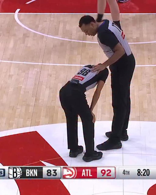NBA ref Sha’Rae Mitchell WENT DOWN with an injury after hitting her head on a camera operator during the Hawks-Nets game 😬