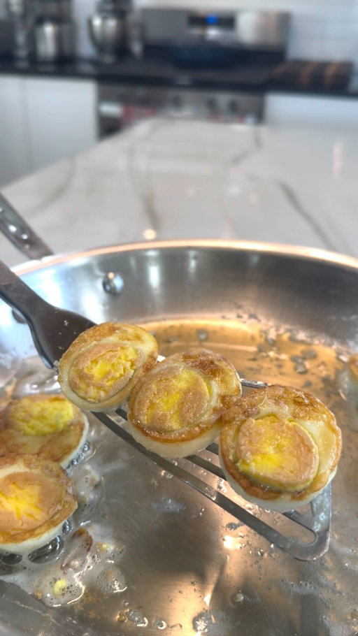 Everyone talking about weight loss foods… but nobody told you crispy fried boiled eggs were the cheat code. 🥚🍳 

Crispy Fried Boiled Eggs

Ingredients:

4 large eggs

1 to 2 tablespoons Wagyu beef tallow (or any high smoke point oil like avocado oil or canola oil)

Salt to taste

Black pepper to taste

Optional toppings:

Hot sauce
Chili flakes
Everything bagel seasoning
Fresh herbs

Instructions

Boil the eggs

Place the eggs in a pot and cover with water. Bring to a boil and cook for 10 to 12 minutes for firm hard boiled eggs.

Cool the eggs

Transfer the eggs to a bowl of cold water and let them sit for 5 to 10 minutes. This stops the cooking and makes them easier to peel.

Peel and slice

Peel the eggs and slice them in half lengthwise.

Heat the skillet

Heat Wagyu beef tallow in a skillet over medium high heat.

Crisp the eggs

Place the egg halves cut side down in the skillet. Cook until the surface forms a golden brown crispy crust and the eggs start to slide around the pan, about 2 to 3 minutes.

Season and serve

Season with salt and pepper and dress them up however you like. Serve immediately while the bottoms are crispy.

#eggs #egg #diet #food #instafood