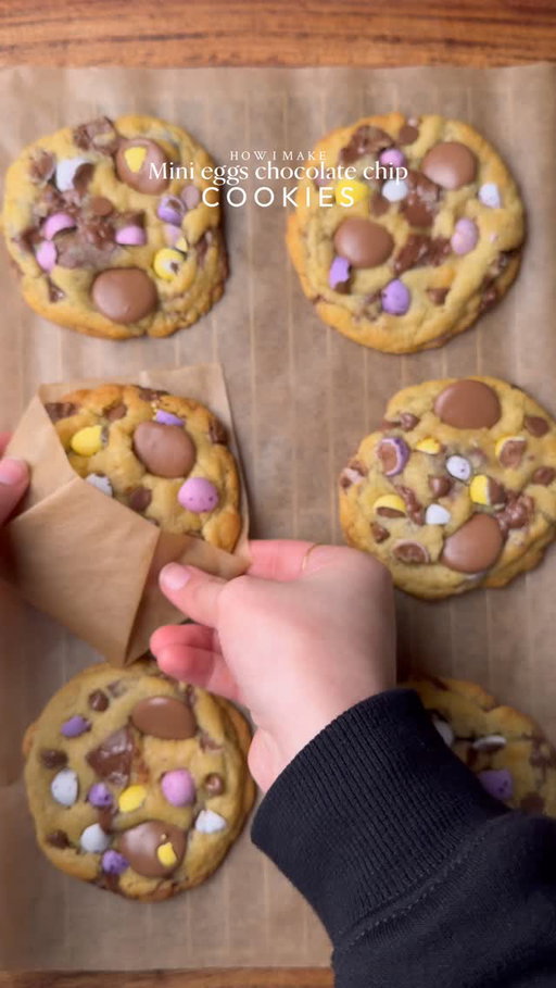 Mini eggs chocolate chips cookies🪺
Yields-7-8 big cookies 
Ingredients:
•115g cold chopped unsalted butter
•80g caster sugar
•80g light brown sugar
•200g mini eggs chopped & chocolate chunks or chips(you can increase or reduce this according to your preference) 
•238g plain flour 
•½ tsp salt
•1½ tsp baking powder
•¼ tsp baking soda
•1 whole egg + egg yolk 
•½ tsp vanilla
Instructions:
•In a large mixing bowl, add the cold cubed butter and whisk until slightly creamy. Add the white sugar and light brown sugar, then whisk together until well combined and fluffy.
•Add the egg+egg yolk, vanilla extract, mini eggs chopped and chocolate chips or chunks. Whisk until fully incorporated.
•Add the flour, baking powder, baking soda, and salt. Gently mix until just combined, do not overmix.
•Portion the dough into 85-90g balls.
•Place the cookie dough balls onto a tray and freeze for at least 30 minutes (or overnight for best results).
•Preheat oven to 175-180C (350°F). Bake for 10-15 minutes or until the tops are lightly golden while the centres remain soft.
•Remove from the oven and let cool slightly.
•Serve warm with ice cream.
NOTE: Store any extra dough balls in an airtight container or freezer bag and freeze for later. Whenever a cookie craving hits, bake straight from frozen🫶🏻

#cookie #chocolate #minieggs #fyp #explorepage