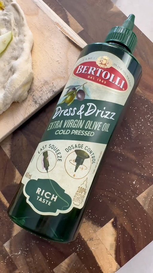 Ask any pizza master and they’ll all tell you, always finish off the pizza with the best olive oil you can find. That’s why I use the World’s Best Olive Oil brand, @bertollioliveoil_australia 

You can use any pizza dough you’re comfortable with, I made this pizza with a 48 hour fermented dough which is just flour, salt, water and yeast.

Toppings:

1/4 cup walnuts
1/2 cup fresh Rocket
1/4 cup blue cheese
1/2 a pear thinly cut
A healthy amount of Bertolli Extra Virgin Olive Oil

When you have stretched out your pizza dough instead of tomato sauce I drizzle Bertolli Extra Virgin Olive oil on the base, then I add the blue cheese and pear.

Cook to your liking,

Once the pizza is out of the oven add the rocket and drizzle a good amount of Bertolli Extra Virgin Olive Oil, the nozzle control helps you get the perfect controlled amount.

The Bertolli Dress and Drizzle
Unbreakable bottle is perfect for clumsy people like me and the nozzle control is perfect for the ideal pour. pick up your Bertolli Olive Oil at Woolworths.

#bertolli #bertollidressanddrizzle #bertolliextravirginoliveoil