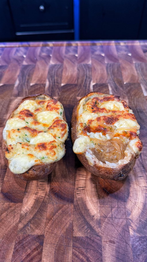 French Onion Soup Twice Baked Potato

INGREDIENTS & RECIPE👇🏻
4 large russet potatoes
4 cups thinly sliced white onions
1/4 cup fresh thyme
1/2 cup salted butter
4 cups beef stock
1/4 cup Sherry cooking wine 
1/4 cup creme fraiche or sour cream
1/4 cup chopped parsley
1/4 cup  softened garlic butter 
1 cup grated  Gruyère cheese
1/2 cup cubed Swiss cheese
2 tbsp onion powder
2 tbsp garlic powder
1 tsp salt and pepper

Melt butter in a large saucepan or pot over medium-low heat (enough to hold the cooked down onions and beef stock)

Add the onions and cook, stirring frequently, until they reduce by half and become translucent (do not brown them)

Add the thyme, beef stock, and sherry. Season with salt and pepper. Simmer on low for 30 minutes

For the potatoes, pierce them with a fork and coat them in olive oil

Bake at 425°F for an hour

Slice off the top and carefully scoop out the inside add it to a bowl with the grated Gruyère cheese, parsley, sour cream or creme fraiche, garlic butter, onion powder, garlic powder and a pinch of salt. 

Add it to a piping bag or a Ziploc bag

Carefully ladle the soup and onions into the hollowed out potato

Add some of the mashed potato mixture on top

Place a few Swiss cheese pieces on top of the mashed potatoes. 

Bake in a 450 degree oven for about 10 minutes or until the top is golden brownand hte cheese is melted