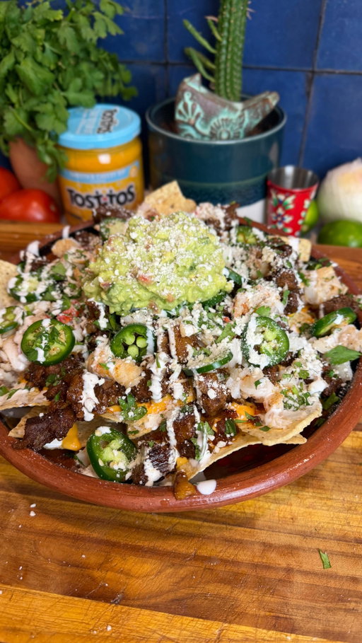 #ad Celebrate with friends and make these Surf and Turf Nachos made with Tostitos® Smooth and Cheesy Flavored Dip. @tostitos #tostitos_partner