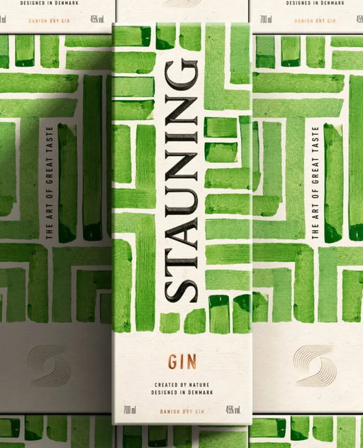 We’re seeing a rise in design that emphasizes craft and process, and this packaging design captures that shift beautifully. ⁠
⁠
For @stauningwhisky, @within.design.studio creates a system that translates traditional Danish printmaking into a  spirits identity full of texture and discovery. The outer box features a grid of hand-painted green forms that resemble carved woodblock prints, where imperfect edges and layered tones give the artwork an ink-pressed quality. This pattern draws from Nordic craft traditions. ⁠
⁠
Link in bio for the full article.