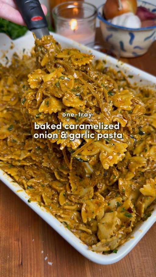One-Tray Caramelized Onion & Garlic Pasta 🔥

Comment “Recipe” and I’ll send you the full recipe card for free!!

For all of you asking… the app is called Osta and is  linked in my bio or you can search “Osta” on the App Store or Google Play store 🫶

Minimal effort, max comfort. Sweet, savory, a little spicy... this one has all the flavor.

Tip: Best served with with chicken, shrimp, or tofu 🫡

Ingredients:

-2 large onions, thinly sliced
-1 whole garlic head
-2 tbsp chili crisp @momofukugoods 
-1 1/2 cups of cream or coconut milk (room temp)
-1 tbsp soy sauce (optional)
-1/2 cup fresh Parmesan cheese, grated
-1/2 lemon, juiced
-12 oz (340 g) pasta of choice
-5 tbsp olive oil
-Pasta water (as needed)
-Seasonings: 1 tbsp paprika, 2 tsp garlic powder, 2 tsp salt, 2 tsp pepper, 2 tsp italian seasoning

Instructions:

1. Preheat oven to 400°F (200°C). Add sliced onions to a baking dish. Toss with paprika, garlic powder, salt, pepper, Italian seasoning, and 4 tbsp olive oil until well coated.
2. Slice the top off the garlic head (about ¼ inch), drizzle with 1 tbsp olive oil, sprinkle with salt, and place it cut-side up on top of the onions. 
3. Cover with foil and bake for 1 hour, tossing the onions every 20 minutes (twice total). Each time, add a splash of water to prevent burning. You’re looking for deep golden, jammy onions.
4. While that magic is happening, cook pasta according to package instructions. Reserve up to 1 cup of pasta water before draining.
5. Remove garlic from the dish and let cool slightly (freezer hack = elite move). Squeeze the roasted garlic into the onions.
6. Add chili crisp, cream (or coconut milk), soy sauce (if using), lemon juice, Parmesan, and cooked pasta. Toss everything together, adding some pasta water as needed until glossy and saucy. Taste and adjust salt if needed.
7. Finish with extra Parmesan, chili crisp, and fresh parsley if you’re feeling fancy.
