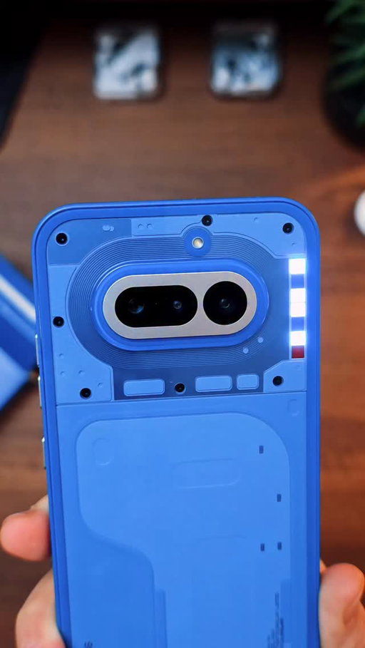 The @nothing Phone (4a) in blue is just stunning!! While I do miss the bigger glyph lighting. This light bar design is kinda growing on me. #tech #reels #unboxing #nothing #heymarkl