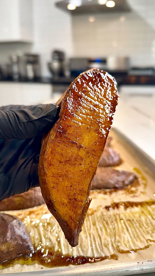 This why I don’t trust everybody at the cookout… I’ve seen how some of y’all treat sweet potatoes. This how they supposed to look… caramelized, rich, and doing something. Respectfully. 🤌🏾🎨

Caramelized Baked Sweet Potatoes

Ingredients

4 medium sweet potatoes, cleaned
1/3 cup olive oil
2 tbsp maple syrup
1/2 tsp salt
1/2 tsp black pepper
1/2 tsp cinnamon
1/2 tsp vanilla extract

Instructions

Grab 3–4 medium sweet potatoes and slice them lengthwise, right down the middle.

In a bowl, combine the olive oil, maple syrup, cinnamon, salt, pepper, and vanilla extract. Whisk everything together until it forms a smooth, lightly thickened mixture.

Add the sweet potatoes to the bowl and coat them evenly, making sure the flat side is fully covered.

Line a baking sheet with parchment paper and place the sweet potatoes flat side down.

Bake at 400°F for 50–55 minutes, until the bottoms are deeply caramelized and the centers are tender.

Let them cool for at least 10 minutes before moving them. This step is important as it allows that caramelized layer to set and release clean from the pan.

#sweetpotatoes #potato #healthy #food #foodstagram