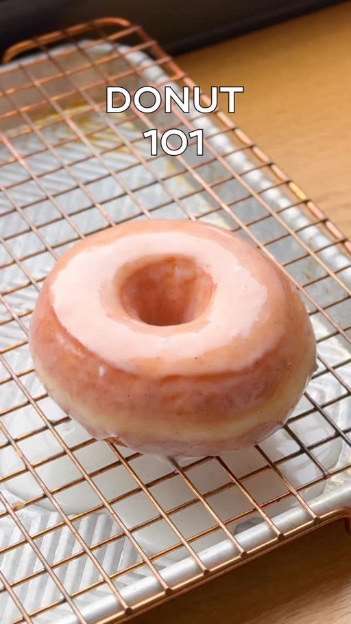 Donut 101! There is nothing that beats a donut fresh out of the fryer, so testing this was my dream! Still a little warm, with that crusty glaze?! Oh my. Anyways, you should make these. The dough is easy to work with, and the final donut is so light and fluffy. I add milk powder and diastatic malt powder which I detail a little more in the written recipe but feel free to skip them. It’s a pretty straight forward dough, the only place you can go wrong is not proofing them for long enough, or undercooking your filled donut as these need a smidge longer to make sure the centre is cooked. Full recipe with lots and lots of info is on my website for free, just hit the link in my bio and enjoy!