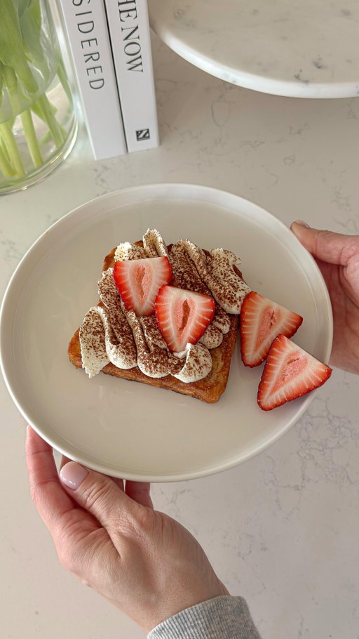 when you want something soft & sweet…

I toast sliced croissant bread in butter until golden and slightly crispy outside.
whip heavy cream with powdered sugar until soft peaks.
spread on top, dust with cocoa and add fresh strawberries.

ingredients:
– 1–2 slices croissant bread
– 10 g butter
– 100 ml heavy cream (30–33%)
– 1–2 tsp powdered sugar
– cocoa powder
– strawberries

save for later 🤍

#aestheticblog #beautifulfood #myeverydaymagic #foodaesthetic #homediaries