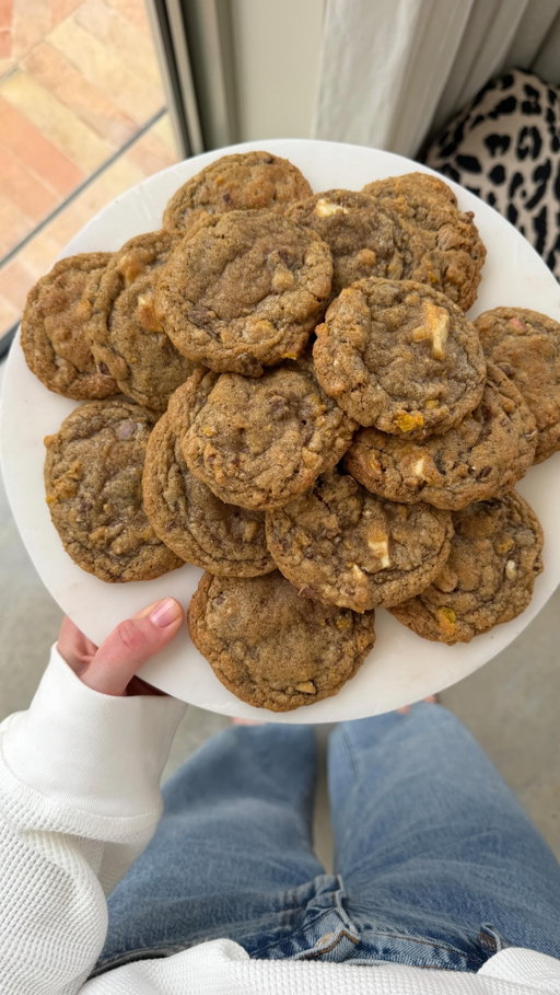 The M&S Speckled Egg Cookie recipe that I reckon is better than the real thing. 

INGREDIENTS:
175g unsalted butter 
150g dark brown sugar 
150g granulated sugar 
2 large eggs 
1 tsp vanilla extract 
350g plain flour 
1tsp bicarbonate of soda 
A sprinkle of salt 
60g cornflakes (don’t get the healthy ones like me!! The normal ones are better!)
100g white chocolate 
3 bags of M&S speckled eggs or 256g bag of mini eggs (keep them in the bag to crush them with a rolling pin) 

Cream together the butter and sugar. 
Add the eggs and vanilla extract and mix. 
Add the flour, bicarb and salt and mix until just incorporated. 
Crush the cornflakes and speckled eggs/mini eggs and add to the mixture with chopped white chocolate. 
Portion out into 20-ish balls - a cookie scoop is best. Put in the freezer for at least 2 hours, overnight is best.
Bake at 180℃ (fan oven) for 10-12 minutes, turning halfway through and allow to cool on the baking sheet. 

#MSCookie #SpeckledEggCookies #CookieRecipe