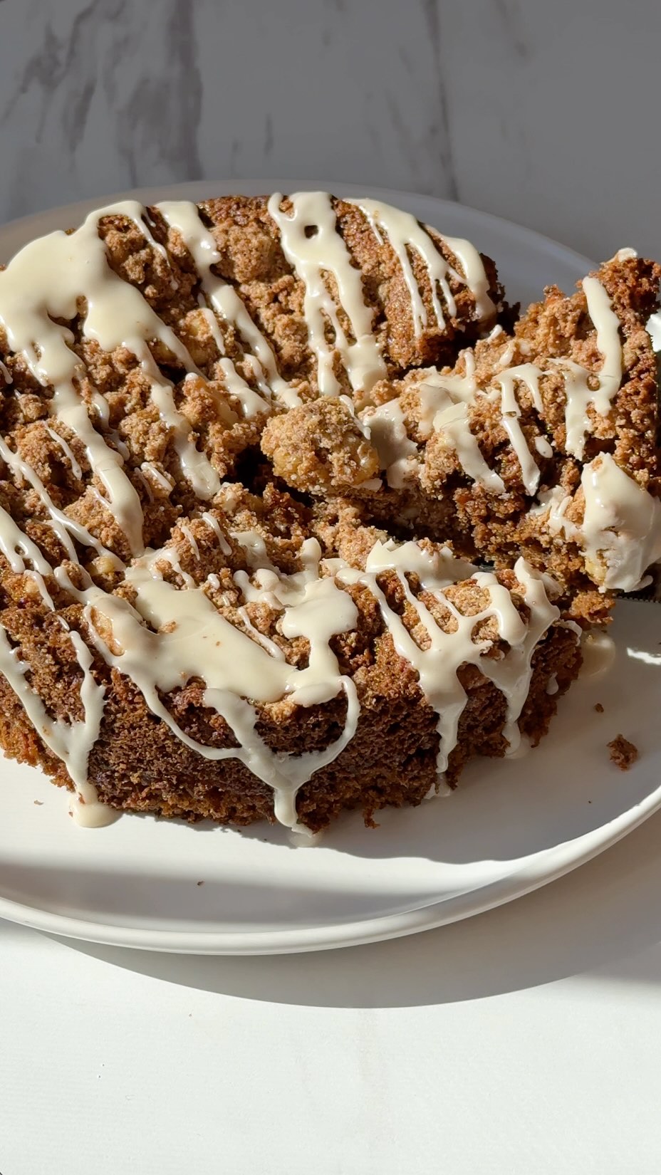 Easter weekend just got a wholeeee lot sweeter 🤭🥕🍰 

In the mood for a little baking with RYZE? This coffee carrot cake is the perfect recipe to try 🤤 Grab the recipe below + don’t forget to SAVE this post for later! 👇

Cake ingredients:

-2 tbsp RYZE Mushroom Coffee
-1 tbsp ground flaxseed + 3 tbsp water
-½ cup coconut sugar
-¼ cup melted vegan butter
-1 tsp vanilla extract
-1 cup oat flour
-1 ½ tsp baking powder
-1 ½ tsp cinnamon
-1 tsp baking soda
-1 cup freshly grated carrots

Crumb topping ingredients:

-½ cup oat flour
-½ cup chopped walnuts
-¼ cup coconut sugar
-1 tsp ground cinnamon
-2 tbsp melted butter

Icing ingredients:

-1 cup powdered sugar
-1-2 tsp milk of choice

Directions:

1️⃣ Preheat the oven to 350°F and grease a 6-inch cake pan. Make the flax egg by combining the ground flaxseed and water in a small bowl. Stir and let it sit for about 5 minutes to thicken.

2️⃣ In a large mixing bowl, whisk together the flax egg, coconut sugar, melted vegan butter, and vanilla extract. Add the oat flour, RYZE Mushroom Coffee, baking powder, baking soda, and cinnamon to the bowl. Stir until just combined, then fold in the grated carrots.

3️⃣ In a separate bowl, make the crumb topping by mixing together the oat flour, chopped walnuts, coconut sugar, cinnamon, and melted butter until a crumbly mixture forms.

4️⃣ Pour the batter into the prepared cake pan, then sprinkle the crumb topping over the batter. Bake for about 30-35 minutes, or until the top is golden and a toothpick inserted into the center comes out clean. Allow the cake to cool for about 10–15 minutes in the pan.

5️⃣ To make the icing, whisk together the powdered sugar and milk until smooth. Drizzle the icing over the cake, slice, and enjoy!

🧑‍🍳 Recipe creds: @booboosbakeryy