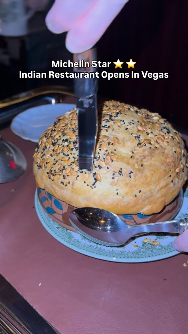 Gymkhana is the 2-star Michelin Restaurant from London serving up insane Indian dishes, and they just opened up their second @gymkhanalasvegas location inside the @arialv.

With @thejoshelkin and @ricklox and our Indian friend for posterity 😭 we descended upon the amazing tasting menu and easily had one of our favorite meals in Las Vegas inside some time.

We housed a little bit of everything, starting with this incredible aloo chat? Sweet, savory, crunchy, crazy. The Venison Biryani was unlike any biryani I had before, opened up tableside, the pastry lid was so incredible I was peeling it off the sides of the dish when the guys weren't looking.

The Gol Guppas we started off with were awesome, popped them little fried wheat puffs with my thumb, filled with lentils/mint/cumin.
 water.

Their "amritsari shrimp & scallops" were off the charts, almost like an Indian spice take on a Nashville hot 😭🥹 crusting up both scallops and shrimp, except they used red chili, carom seed batter and dill.

The Tandoori Masala Lamb Chops...you see me lose my mind on it. It made it the best meal of our weekend by far.

The Salmon Tikka dish was a sight, but ended up tasting incredible. The Quail Seekh Kebab had us thinking Persian koobideh and spawned a table convo about Kibbeh 😭

I can't recommend this place enough. I'm sure I missed menu items, especially the desserts...but plz let me know what I missed, or if anyone watching wants to come with me on a repeat visit?! 😭🥹😮‍💨👇🏽👇🏽👇🏽