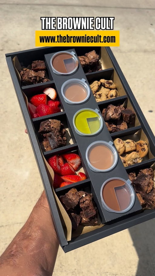 FOR MY BROWNIE & COOKIE LOVERS!, got this new business for you to try out calls @thebrowniecult 🔥. They make these beautiful downplays  of Mini Cookies & Brownies for you to try out with they different sauces. They are located in Richmond, Tx, where they do Pickups & Deliveries from. 

If you stay in Sugarland or Richmond, Deliveries are Free. These are great for Family Dessert Nights, Birthdays, Gifting, Date Nights & more. 

You can choose:
1. The Signature Cult Box - 10 Grid Box ($45)
2. The Mini Cult Box- 8 Grid Box ($35)
3. The Cult Carrier ($20)

Signature & Mini Cult Boxes comes w/ Cookies, Brownies, Strawberries & different sauces. 

Make sure to check out they IG: @thebrowniecult
Website: TheBrownieCult.com

They also will be adding more option in the future & they also will be have DoorDash in the near future as well so you can order from the DoorDash app as well. 

#houstonfood #houstoneats #houstondesserts