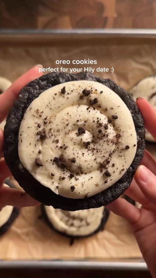 oreo cookies -> what to make to impress your @hily_app date #hilycreator #hilyapp
cookies:
1/2 cup (113g) unsalted butter, soft
1/2 cup (100g) light brown sugar
1/4 cup (50g) white sugar
1 egg + 1 egg yolk
1 tsp (4g) vanilla
1 1/4 cups (155g) ap flour
1/4 cup (25g) black cocoa powder
1/2 tsp (2g) baking powder
1/2 tsp (3g) baking soda
1/2 tsp (3g) salt
3/4 cup (120g) chopped oreos
1/2 cup (85g) white chocolate chips (optional)
*cream together the butter and sugars until smooth and fluffy. add in the eggs and vanilla. in another bowl, whisk together the flour, cocoa powder, baking powder, baking soda, and salt. add the dry to the wet and then fold to combine. mix in the white chocolate chips and most of the oreos (saving some for later). scoop and set in the fridge for an hour. bake at 350 for 11-15 min depending on the size. let cool fully.

frosting:
8 oz (226g) cream cheese, soft
4 tbsp (57g) unsalted butter, soft
1/2 tsp (2g) vanilla (paste if avail)
pinch salt
3–4 cups (360–480g) powdered sugar
1–2 tbsp milk/cream if needed
*cream together the cream cheese and butter until smooth. mix in the vanilla, salt, and powdered sugar. thin it out with milk or cream as needed. pipe on the fully cooled cookies and sprinkle on oreo crumbs :)