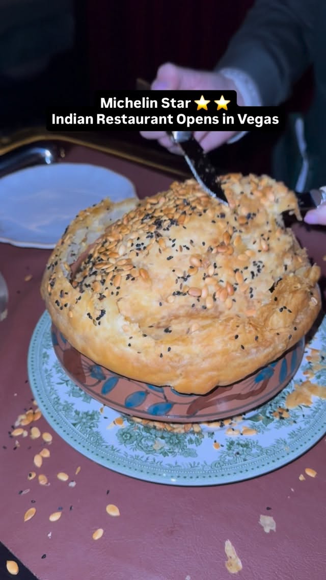 Gymkhana is the 2-star Michelin Restaurant from London serving up insane Indian dishes, and they just opened up their second @gymkhanalasvegas location inside the @arialv.

With @thejoshelkin and @ricklox and our Indian friend for posterity 😭 we descended upon the amazing tasting menu and easily had one of our favorite meals in Las Vegas inside some time.

We housed a little bit of everything, starting with this incredible aloo chat? Sweet, savory, crunchy, crazy. The Venison Biryani was unlike any biryani I had before, opened up tableside, the pastry lid was so incredible I was peeling it off the sides of the dish when the guys weren't looking.

The Gol Guppas we started off with were awesome, popped them little fried wheat puffs with my thumb, filled with lentils/mint/cumin.
 water.

Their "amritsari shrimp & scallops" were off the charts, almost like an Indian spice take on a Nashville hot 😭🥹 crusting up both scallops and shrimp, except they used red chili, carom seed batter and dill.

The Tandoori Masala Lamb Chops...you see me lose my mind on it. It made it the best meal of our weekend by far.

The Salmon Tikka dish was a sight, but ended up tasting incredible. The Quail Seekh Kebab had us thinking Persian koobideh and spawned a table convo about Kibbeh 😭

I can't recommend this place enough. I'm sure I missed menu items, especially the desserts...but plz let me know what I missed, or if anyone watching wants to come with me on a repeat visit?! 😭🥹😮‍💨👇🏽👇🏽👇🏽