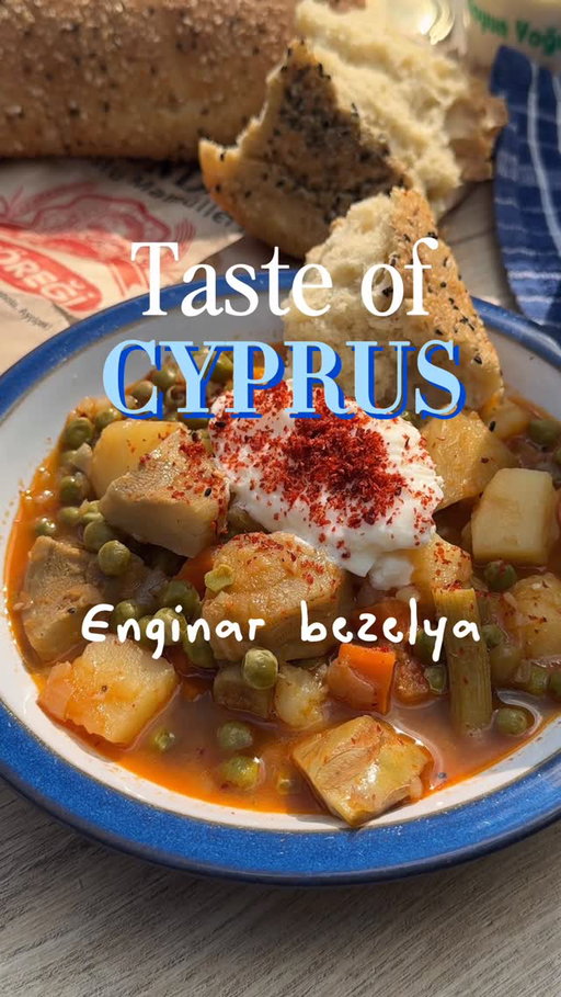 Cooking with mum in Cyprus! Welcome to Taste of Cyprus

Enginar bezelya recipe:
400g garden peas 
4 fresh articokes 
2 onions
4 gloves garlic 
2 tbps tomato paste 
60ml olive oil 
Salt & pepper 

method:
prep the articokes by removing the outer leaves, cut off the top and spoon out the inner fury bit, peel the stalk and cut into wedges, add straight into lemon water to stop oxidation. add the chopped onions into pan with olive oil, then the garlic until soft & sweet, add tomato paste & season salt and pepper, let the tomato paste cook down and release its oil, each step should be low and slow. then add the fresh peas and articokes, add enough veg stock to cover the veg and simmer for 30-40 mins, finish with fresh parsley & drizzle of olive oil 

#cyprusfood #articoke #freshpeas #tasteofcyprus #plantbased