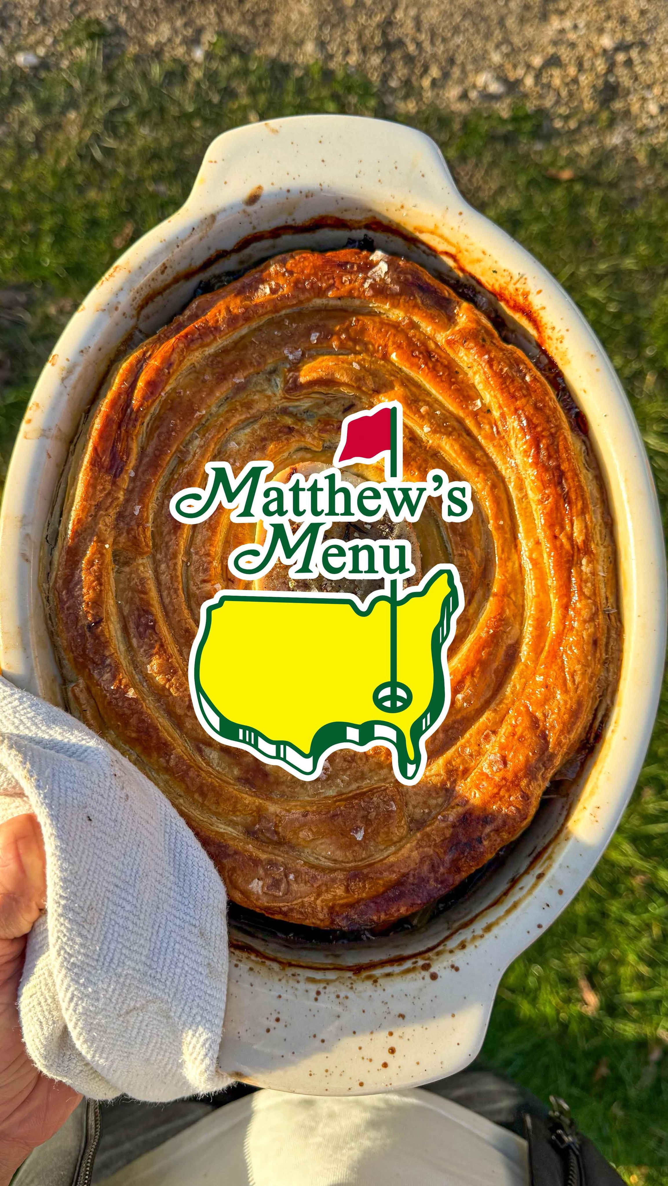 MASTERS WEEK - MY CHAMPIONS DINNER 
 
STEAK + GUINNESS PIE
 
Ingredients:
4 portions (+ enough pie mix to freeze for another 4 person pie)
1kg Braised Beef (ox cheeks, short rib, feather blade)
750g Minced Beef
1 Small Bone Marrow (3-inch piece)
375ml Guinness
1.25L Brown Chicken Stock
750ml Red Wine
2 Shallots
500g Chestnut Mushrooms
5 Garlic Cloves
375g Potatoes (diced)
250g Carrots (diced)
½ Head Celery (diced)
Parsley, Tarragon, Chervil (chopped)
Black Pepper
Worcestershire Sauce
Balsamic Vinegar
1 Sheet Puff Pastry
1 Egg

- Heat vegetable oil in a pan and caramelise the mince, shallots, mushrooms, and garlic in batches until deeply browned. Drain excess fat and reuse the oil between batches.
- Boil the Guinness until reduced by one-third, then repeat with the red wine.
- Combine the reduced alcohol and stock in a pan and bring to a simmer. Add the cooked mince, shallots, mushrooms, and garlic. Cook over gentle heat for an hour, skimming the fat regularly.
- Add the potatoes and cook for eight minutes. Stir in the carrots and celery. Flake the braised beef into the broth along with its cooking liquor.
- Stir in black pepper, Worcestershire sauce, and balsamic vinegar. Just before assembling the pie, add freshly chopped herbs.
- Keep the pastry cold and cut it into 2cm strips. Place the bone marrow in the centre of the dish and fill it with the pie mixture. Wrap the pastry strips in a circular pattern over the filling.
- Brush with egg wash and bake at 180°C for 20 minutes until golden and crispy.