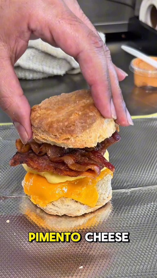 One of LA’s most sought after and delicious breakfast sandwiches comes from @calabama. 🥪 It’s cheesy, buttery, perfectly salty, comforting and it’ll be in your hands to devour in minutes upon ordering. Calabama started up during Covid and gained fame for an awesome breakfast sandwich with a unique bucket-drop pick-up from a fire escape. 🪣 The bacon, egg and cheese biscuit sandwich on a homemade biscuit might be even better than the OG but try them both for yourself and you decide! Have you been to Calabama yet?! Like, comment or share this with a friend who loves breakfast sandwiches! ✌️😎🥓🍳🍔 #losangeles #food #foodie #breakfast #sandwich 

📲 @calabama 
📍 6751 Santa Monica Blvd

Order:
- OG Breakfast Sandwich
- Biscuit W/ Pimento Cheese
- Cold Brew
