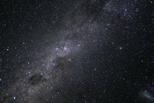 Sky full of stars.

Following a successful lunar flyby, the Artemis II astronauts captured this breathtaking photo of our galaxy, the Milky Way, on April 7, 2026. 

Alt text: A starfield filled with thousands of stars and shining clouds of dust. The Milky Way’s elegant spiral structure is dominated by just two arms wrapping off the ends of a central bar of stars. Spanning more than 100,000 light-years, Earth is located along one of the galaxy’s spiral arms, about halfway from the center. 

Credit: NASA