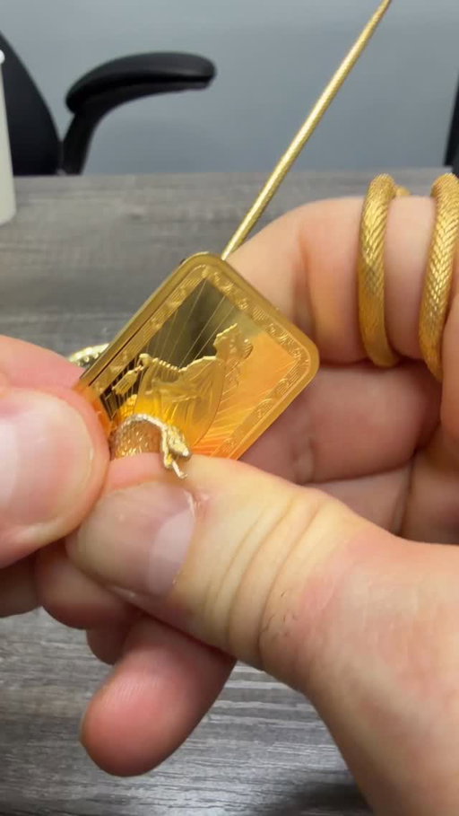 Pure 24k gold , 1 of 1 , search “snake” on Traxnyc.com