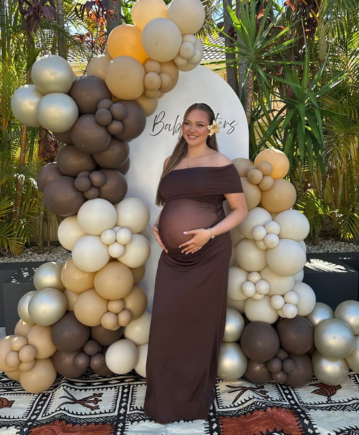 Celebrating our mini 🤎 the countdown begins we can’t wait to meet you 🥹