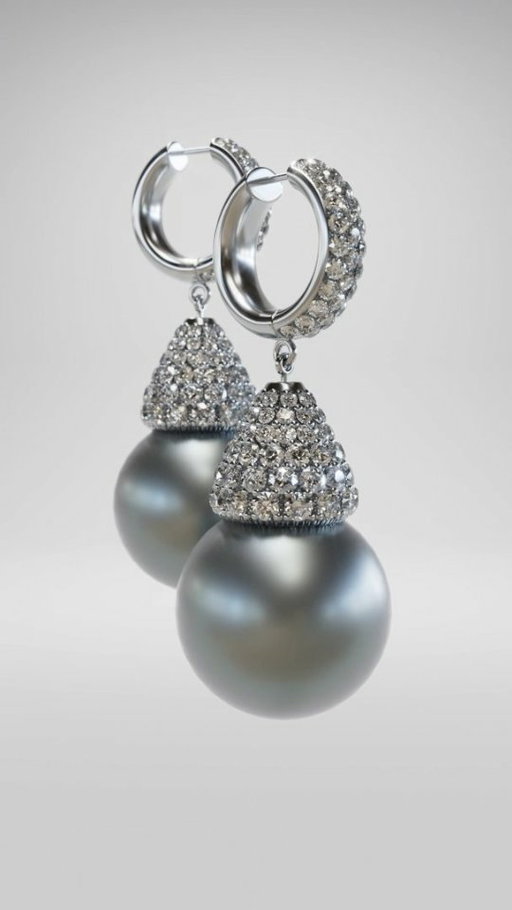Sculpted light and luxury. Sublime Akoya pearls suspended from dramatic pavé diamond bales.

#HumbertownJewellers #Toronto #luxury