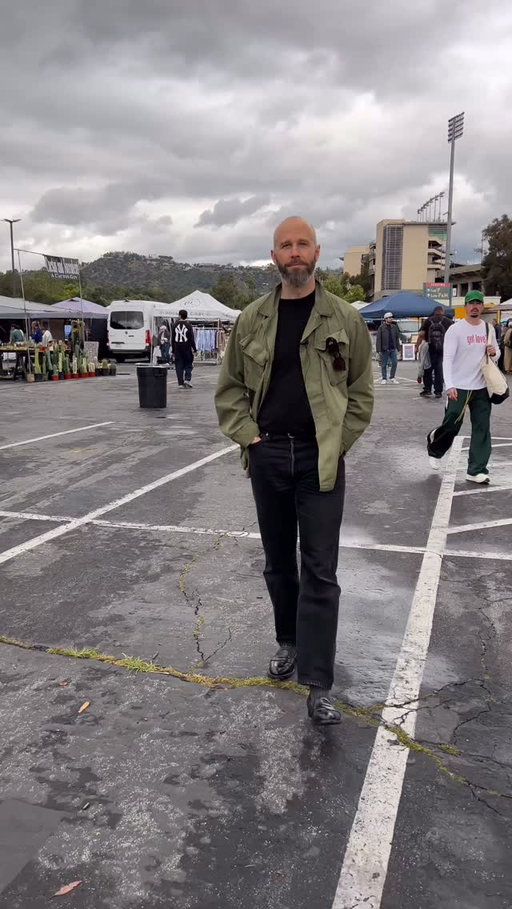 Walkie Talkie 1 from LA!

Walking the Rose Bowl flea market on an unusually wet LA morning
Talking about the articles we’re focusing on during this week in the city

Wearing:
- Vintage US military jungle jacket
- Rubato knitted tee
- Rubato black alligator belt
- Vintage black Levi’s
- Alden black full-strap loafers