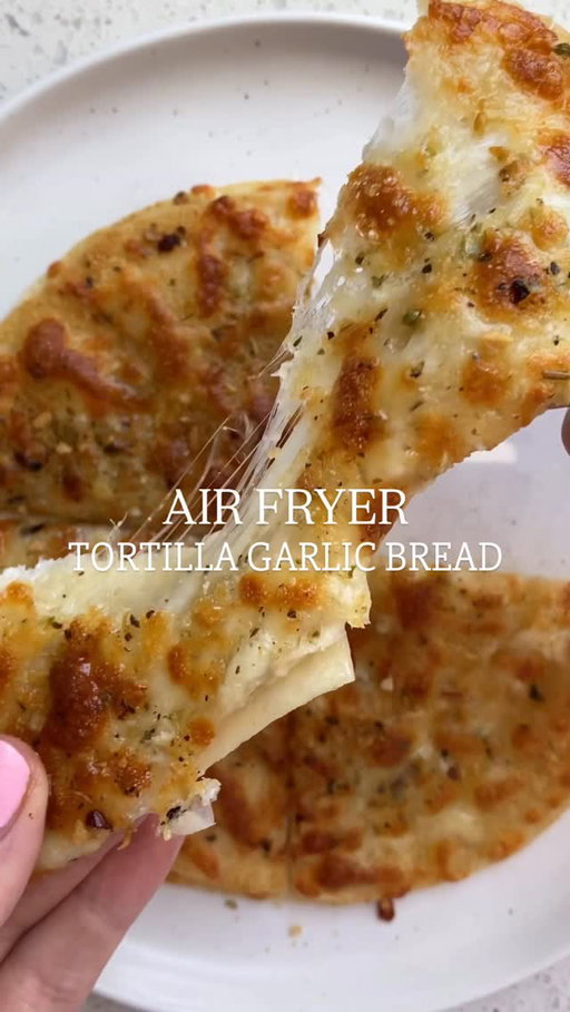 One of my favourite trending recipes of all time - SO worth the hype. Seriously so good. 

And only 5 ingredients, HELLO. In case you haven’t noticed, easy and approachable recipes are my fav 🙌🏻

Comment “recipe” and I’ll send the full printable recipe, macros, tips and tricks straight to your DM’s! https://basicswithbails.com/popular/air-fryer/air-fryer-tortilla-garlic-bread-easy-tiktok-recipe/

INGREDIENTS -
Tortillas
Butter (or avocado oil spray for less indulgent, lower cal version)
Mozzarella cheese
Garlic powder
Italian seasoning

#airfryerrecipes #airfryergarlicbread #garlicbreadrecipe #airfryertortilla