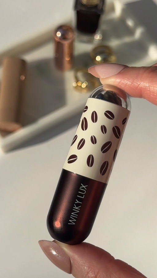 I think this is what they mean when they say espresso lips- because there are literal espresso beans inside this packaging 
@winky_lux Espresso ‘Tini lip balm ☕️ and yes it smells amazing 
#newmakeup #lipbalms #ultahaul #lipcombo #lipglosses