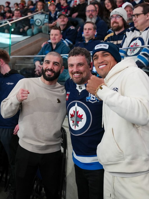 A visit down at @CanadaLifeCentre! 🇨🇦🏒 Thanks for hosting @AiemannZahabi and @CharlesDoBronxs, @NHLJets! 🔵⚪️ #UFCWinnipeg