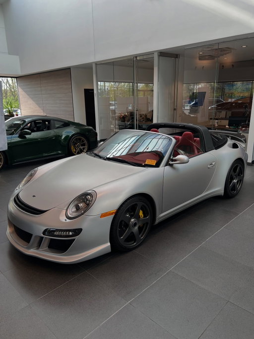 Say hello to this one of one 2011 RUF Rt Roadster. This fully bespoke 911 is based on the RUF Rt 12 S and inspired by the early Porsche “soft-window” Targa.

Available now, exclusively at @paulmillerporsche 

Powered by a matching-numbers, twin-turbocharged 3.8-liter flat-six engine producing 600 horsepower and 538 lb-ft of torque, it outpaces even the 911 Turbo S of its era. Paired with a seven-speed dual-clutch transmission and all-wheel drive, it delivers both thrilling performance and traction.

Finished in the custom Chroma Flash Hologram Matt, the Rt Roadster features a color-shifting finish that complements its Dark Grey rollbar, color-matched hard top, and 19-inch forged center-lock wheels. Yellow RUF-branded calipers clamp onto carbon brake discs, while RUF-tuned suspension enhances handling.

Inside, Red leather upholstery with Silver stitching is accented by carbon fiber trim and an interior paint package that mirrors the exterior hue. Foldable carbon sport bucket seats, Stone Grey carpets, silver seatbelts, touch-screen navigation, and a BOSE Surround Sound System complete the interior.

#ruf #rufsince1939 #porsche #porschemoment #rarecars