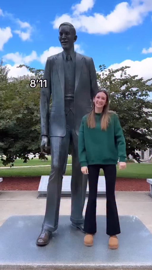 Standing next to the Tallest Man in the World.  #tall #throwback