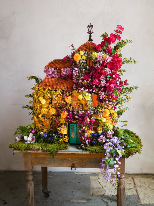 Excited to finally share a fun project I’ve been working on over the past few weeks with @disney. Recreating La Casita Madrigal from the movie Encanto entirely out of flowers has been such a special experience from start to finish. I can’t help but love how this one came out. 

Encanto is one of my favorite Disney movies, so getting the opportunity to bring this world to life was pure magic. I tried my best to capture the same colorful and whimsical energy of the movie itself. 

The house is made entirely out of carnations, hydrangea, dianthus, wax flower, moss, orchids and more.

Huge thank you to @disney for trusting my vision for this project!

If you want to see the full process of how I created La Casa Madrigal out of flowers, head to Disney’s official YouTube page to watch the full video. You don’t want to miss it! 
.
.
.
.
#florist #disney #encanto #floraldesign #flowers