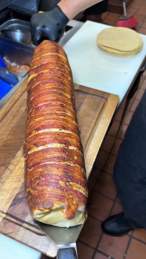 Sure, it looks like stunt food, but @sayulitaslasvegas brand of Mexican meets Filipino cuisine is delicious and this wild burrito featuring lumpia and a whole lot more is a great example of that!!
