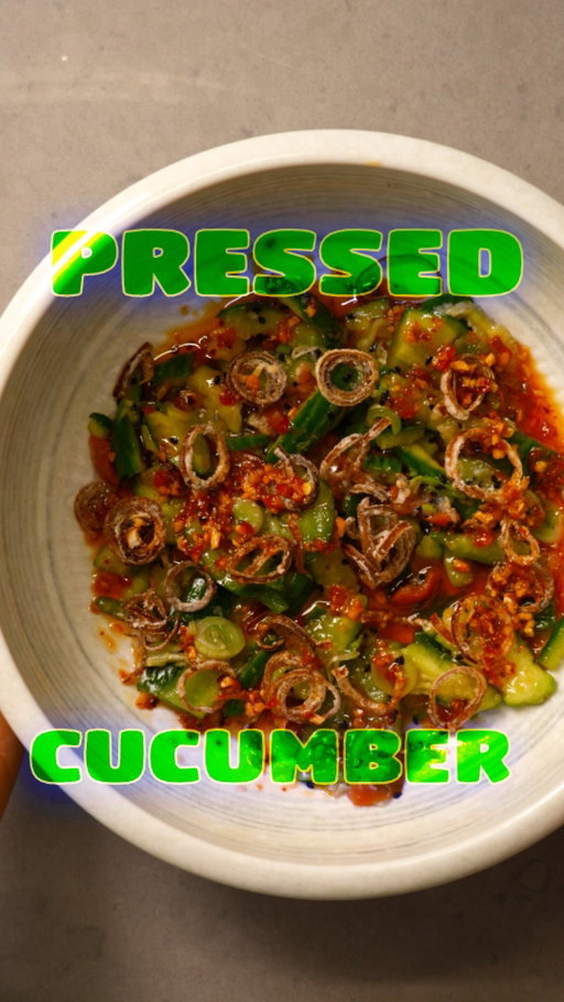 do you know why we smash cucumbers? comment “Smash” and i’ll send you the recipe. smashed cucumber for more surface area and maceration ,spring onion, ume pickle, garlic chili crunch.